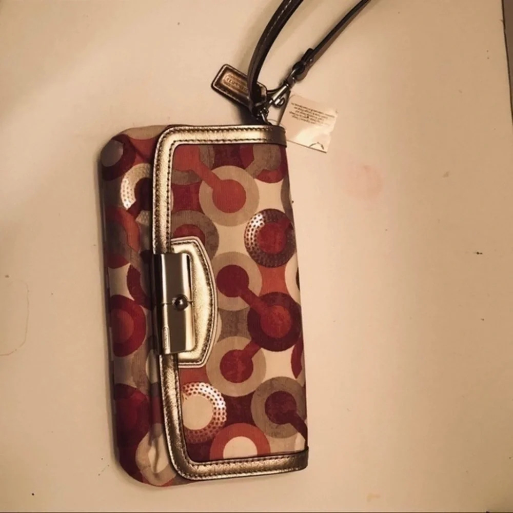 Coach optic c pink metallic wristlet bag clutch